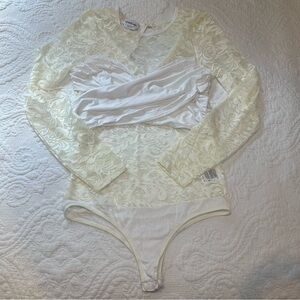 Bebe White Lace Sheer Long Sleeve Bodysuit. Size: Medium.